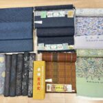 茨城県で老舗呉服店をされていた、京都市北区在住の業者様より、黄八丈の八寸帯地や知念貞男さんの着尺などを高価お買取りさせていただきました。